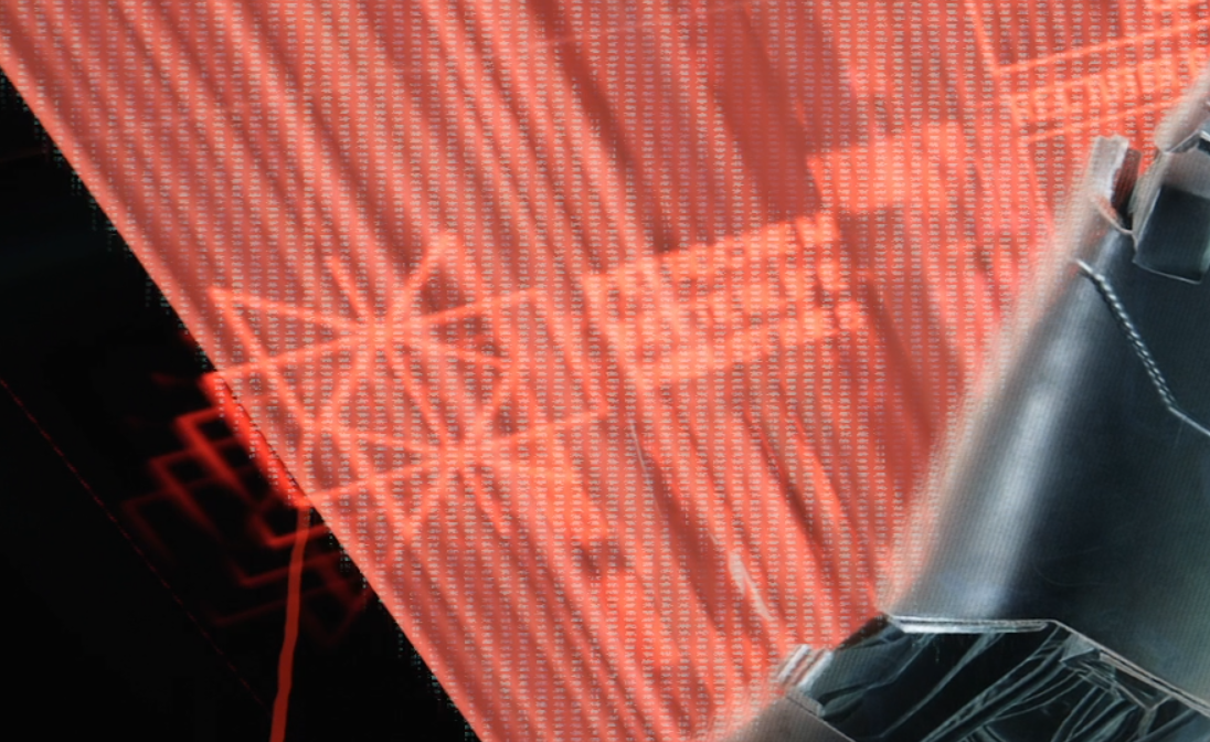 The Petrochem logo on the Mikoshi access point contains the same axis. They combine to form interconnected panels in 3D.